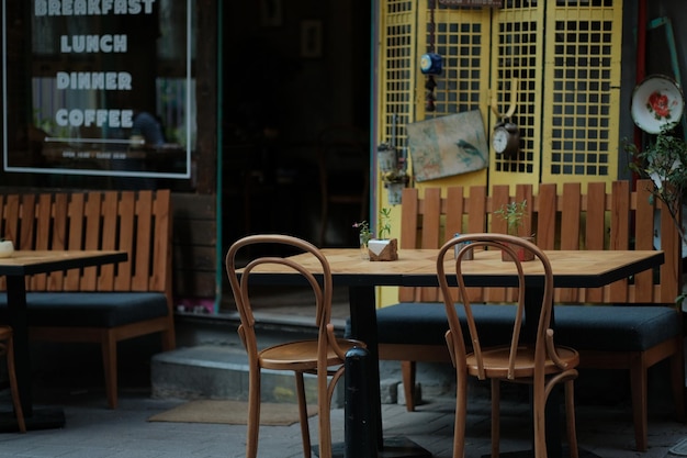 Free Photo empty cafe on the street terrace with chairs and tables for guests