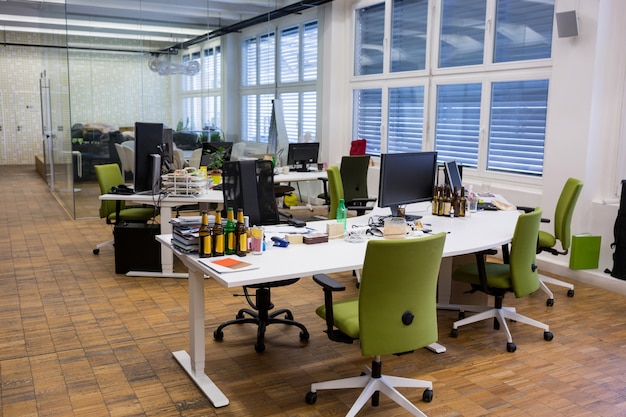 Empty chairs and table in office