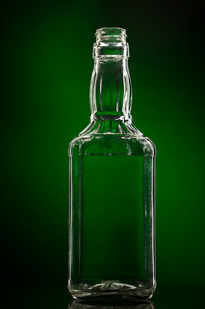 Free photo empty colorless glass bottle