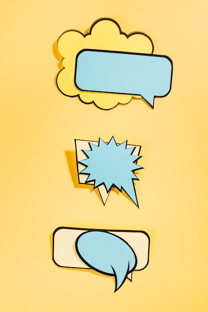 Empty comic speech bubbles on yellow background