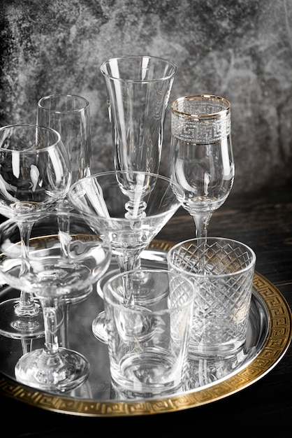 Free Photo empty crystal glasses with marble background