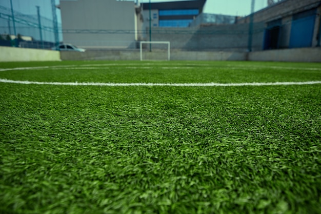 The empty football field and green grass