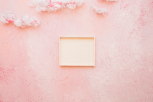 Empty frame with soft cotton wool cloud