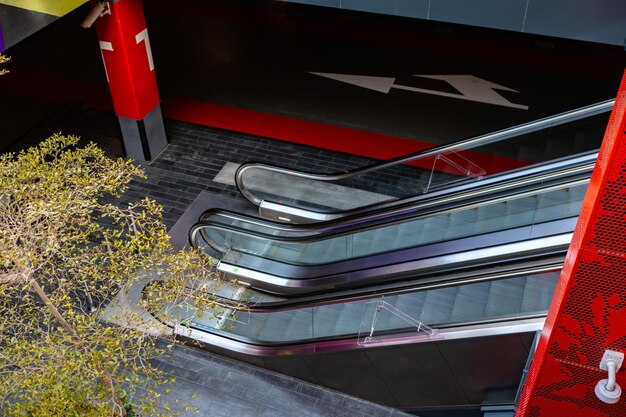 An empty modern escalator in a building