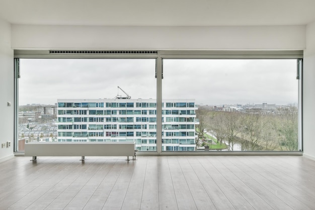 Empty room with laminate flooring and french windows