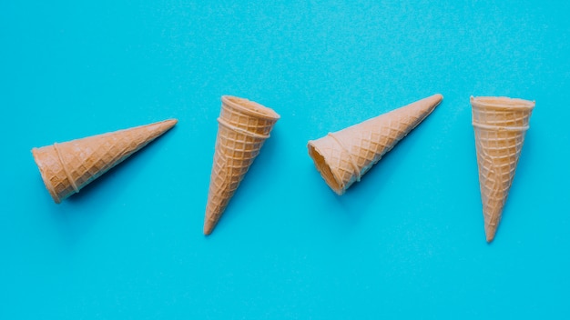 Free Photo empty waffle cones on table