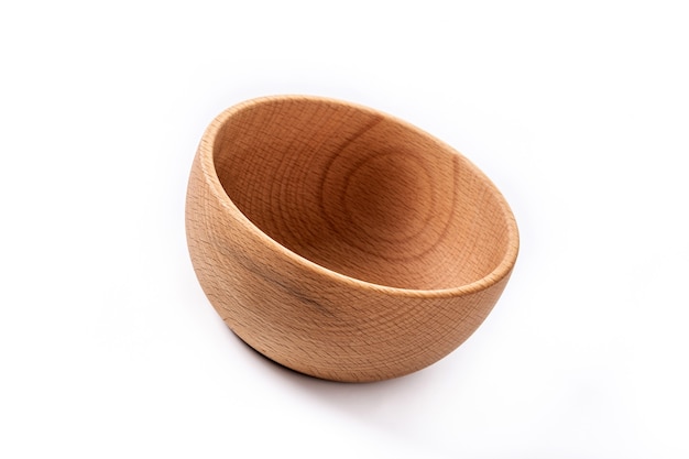 Empty wooden bowl isolated on white background