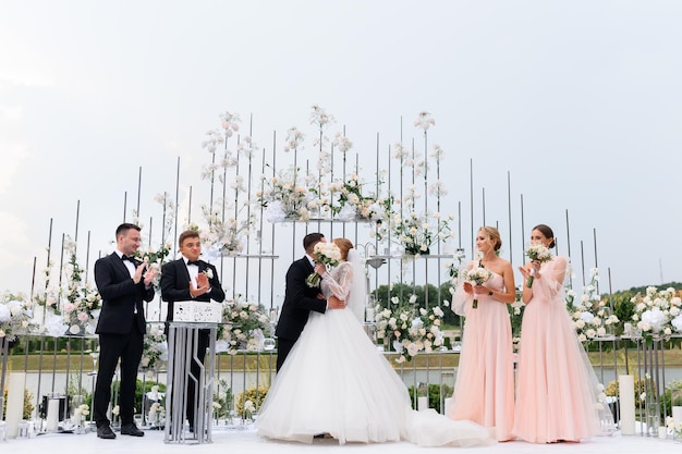 Engagement Of Bride With Groom On Outdoors Ceremony With Friends