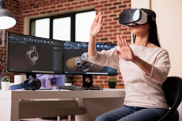 Free photo engineer using vr glasses to manufacture gears product with virtual reality technology and cad software on computer. technician engineering industrial machinery turbine with interactive headset.