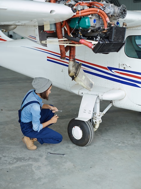 Free Photo  engineer working with a airplane