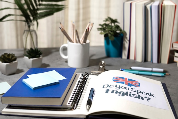 English book resting on the table of working space