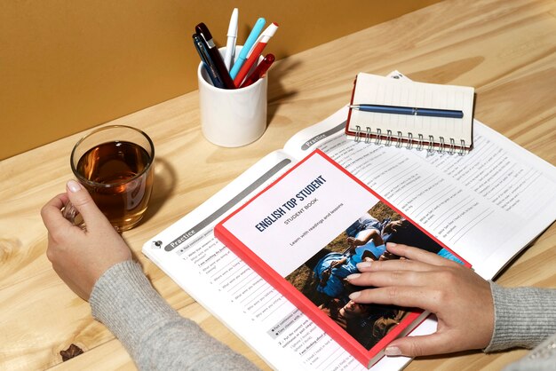 English book resting on the table of working space