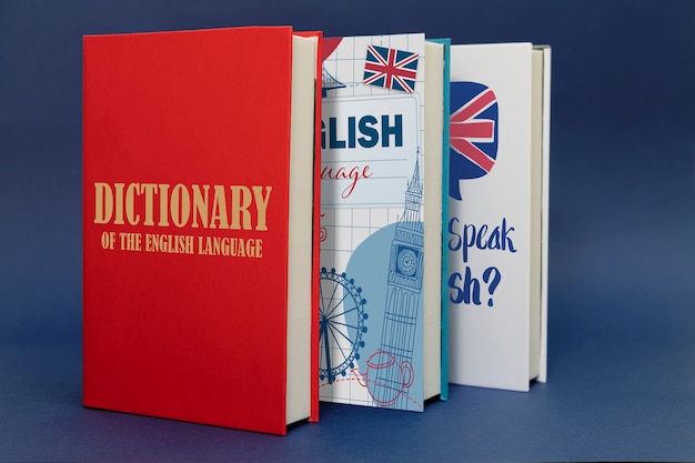 Free Photo english language books with blue background