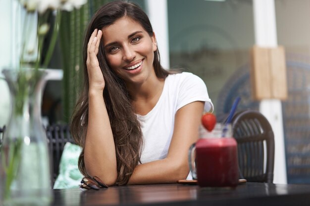 Entertained attractive girlfriend laughing happily touch haircut