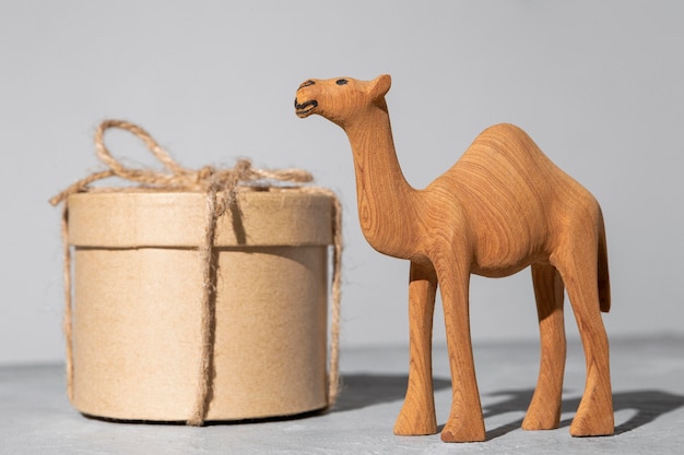 Free Photo epiphany day camel figurine and gift box