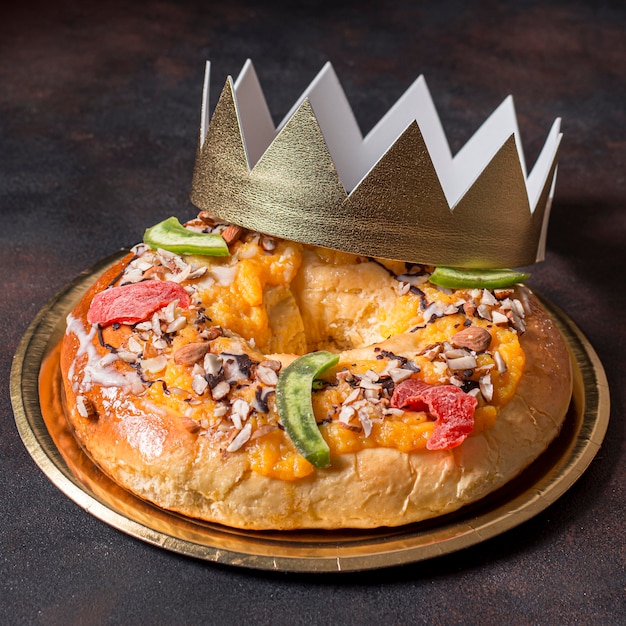 Epiphany day food with golden crown close up