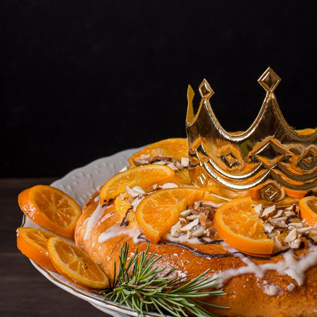 Epiphany day food with sliced oranges close up