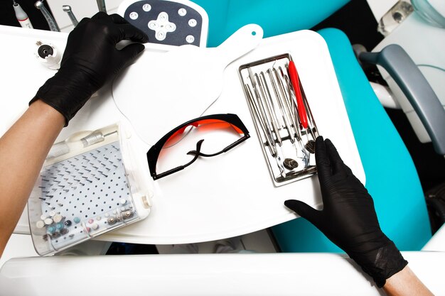 Equipment and dental instruments in dentist's office. Tools close-up.