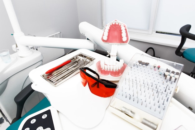 Equipment and dental instruments in dentist's office. Tools close-up.