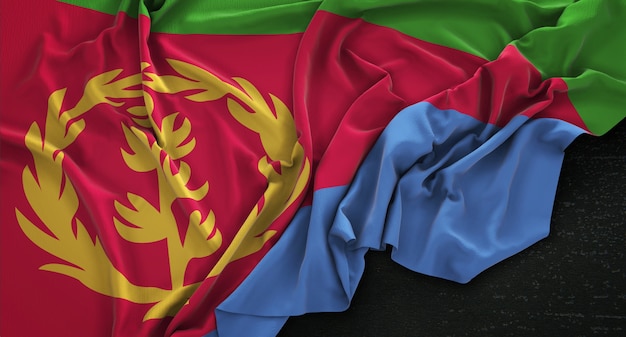 Free photo eritrea flag wrinkled on dark background 3d render