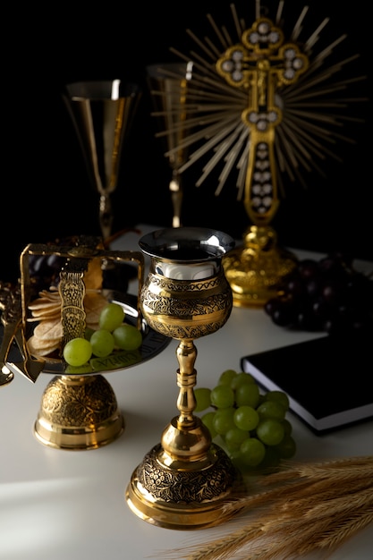 Eucharist celebration with chalice and grapes