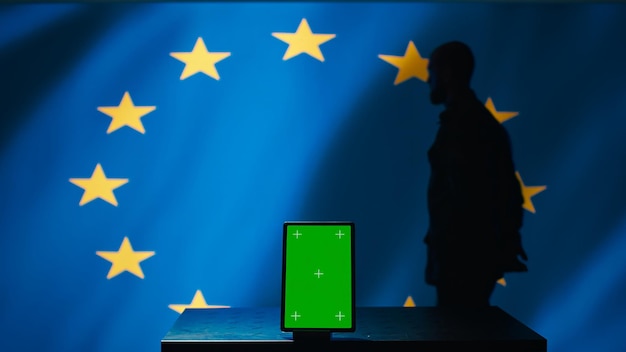 Free Photo european union counterintelligence division uses green screen tablet