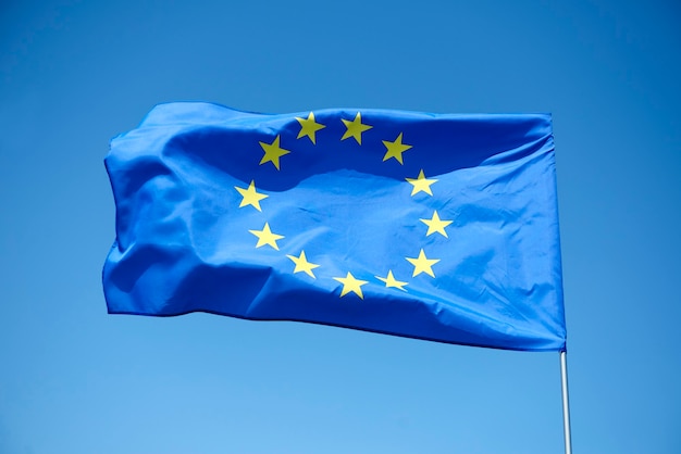 Free Photo european union flag on the blue background