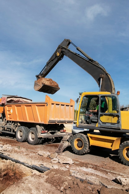 Free Photo excavator digging in the ground on day light