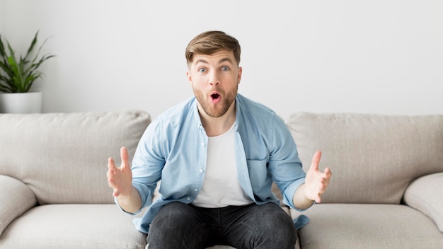 Excited man on couch