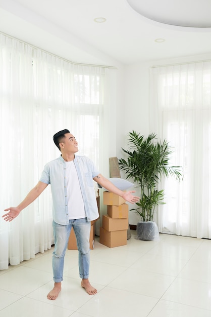 Excited man happy with new apartment