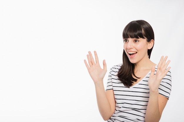 Excited woman looking left