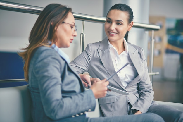 Executive talking with her partner