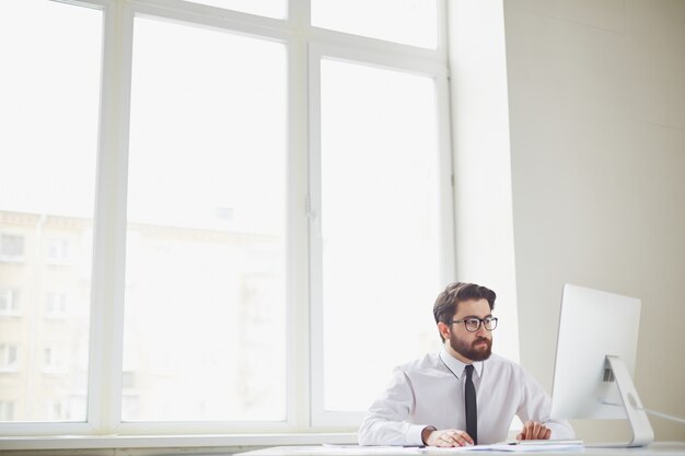 Executive working alone in the office