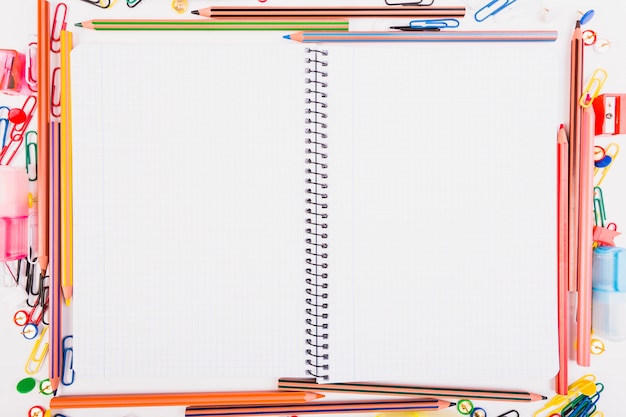 Free photo exercise book with school stationery