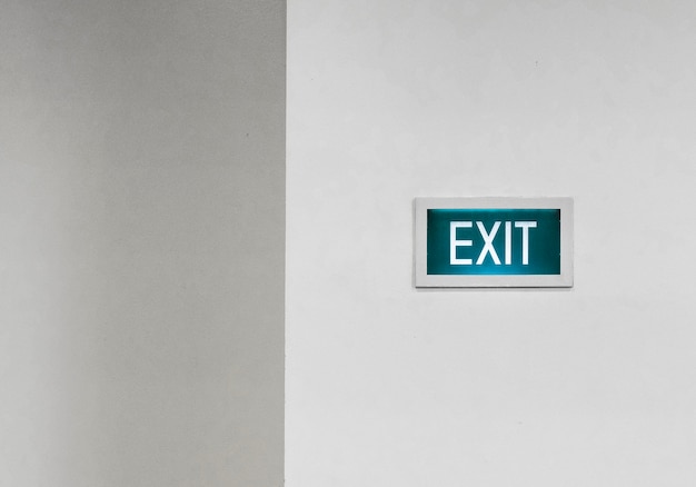 Free Photo exit signboard on a white wall