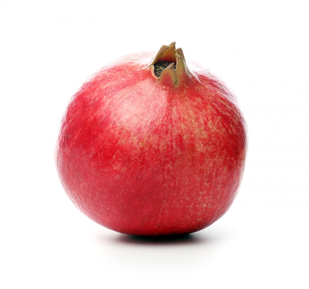 Exotic and delicious pomegranate on white background