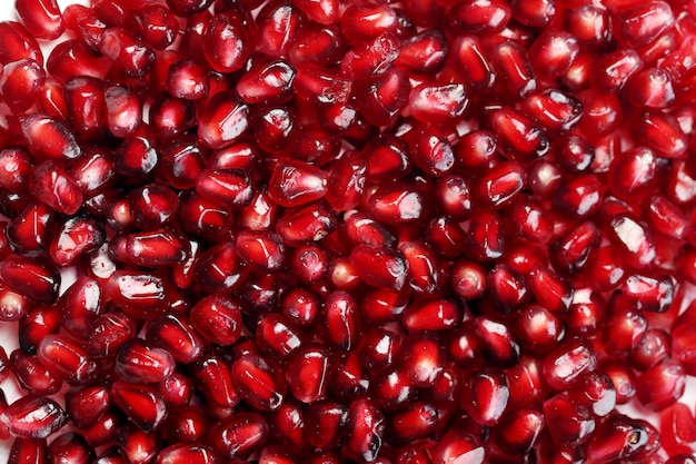 Exotic and delicious pomegranate on white background