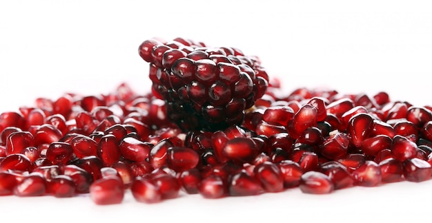 Exotic and delicious pomegranate on white background