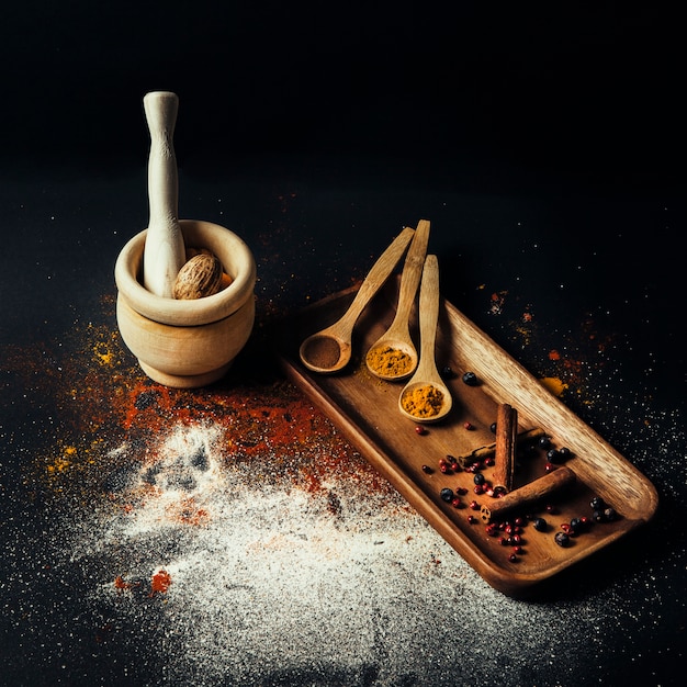 Free Photo exotic spices composition with mill