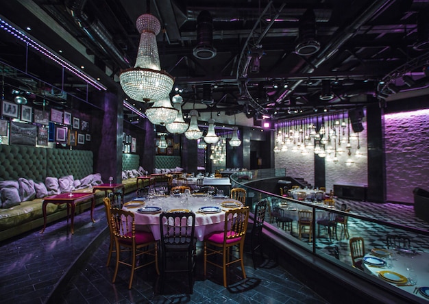 Free Photo expensive restaurant interior view with colorful illuminating