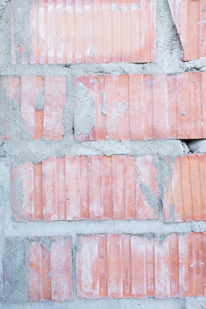 Exposed brick wall with concrete