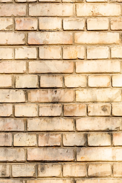 Free Photo exposed dirty brick wall