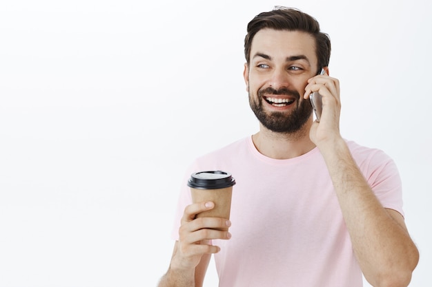 Expressive bearded man in pink Tshirt