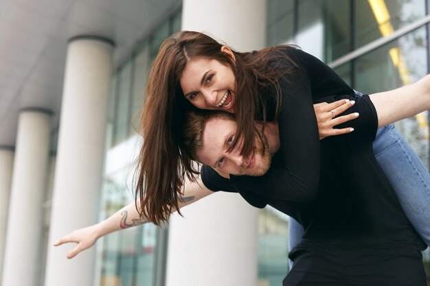 Expressive couple posing outdoor