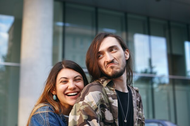 Expressive couple posing outdoor