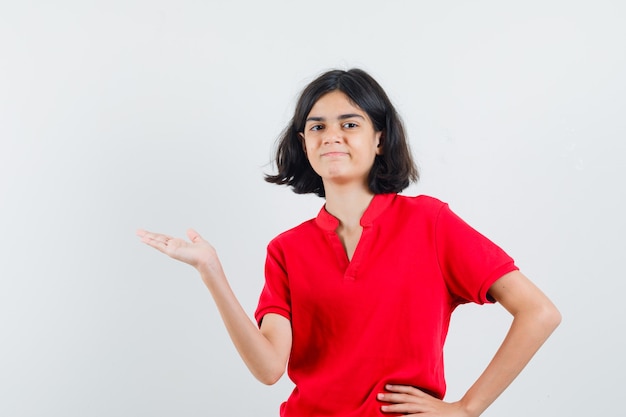 An expressive girl is posing in the studio