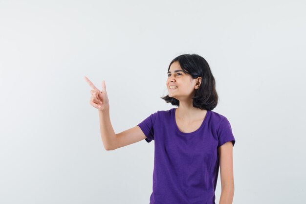 An expressive girl is posing in the studio