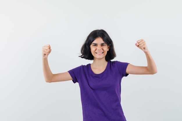 An expressive girl is posing in the studio