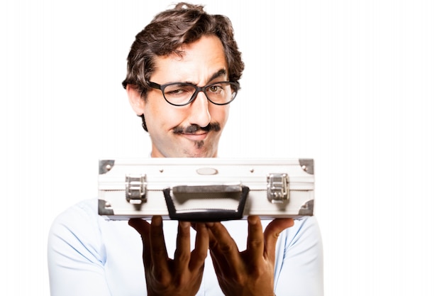 Free Photo expressive man holding a briefcase