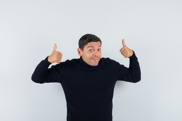 An expressive man is posing in the studio